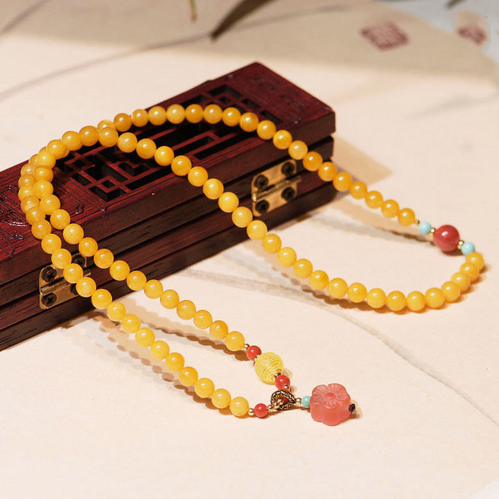 Collier d'équilibre et de guérison en ambre, bracelet à breloques en forme de fleur