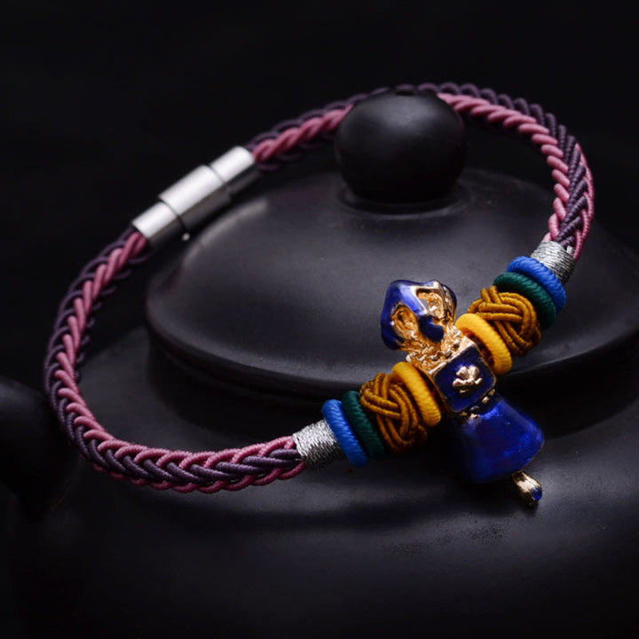 Bracelet tibétain fait main en corde Dorje Vajra à huit fils