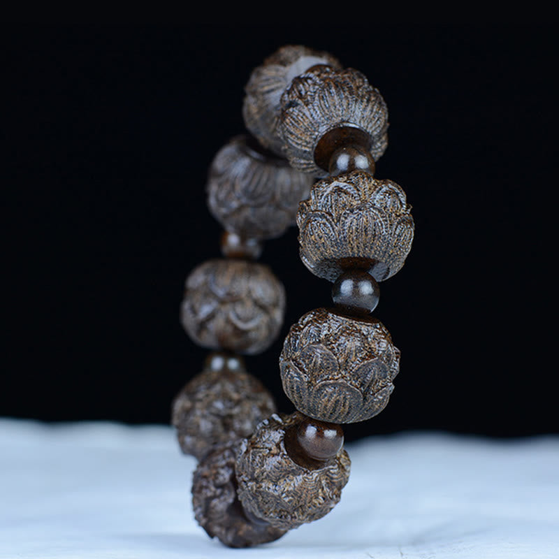 Bracelet d'équilibre gravé en bois d'ébène avec Buddha Stones et dragon de lotus des dix-huit arhats