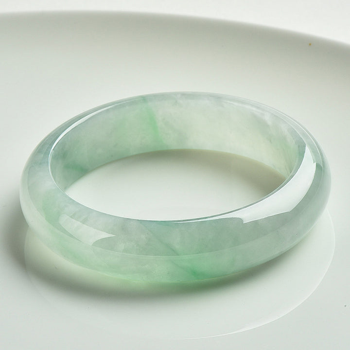 Bracelet jonc en jade naturel Buddha Stones pour la prospérité, la richesse et la chance - 63-64 mm - image 0