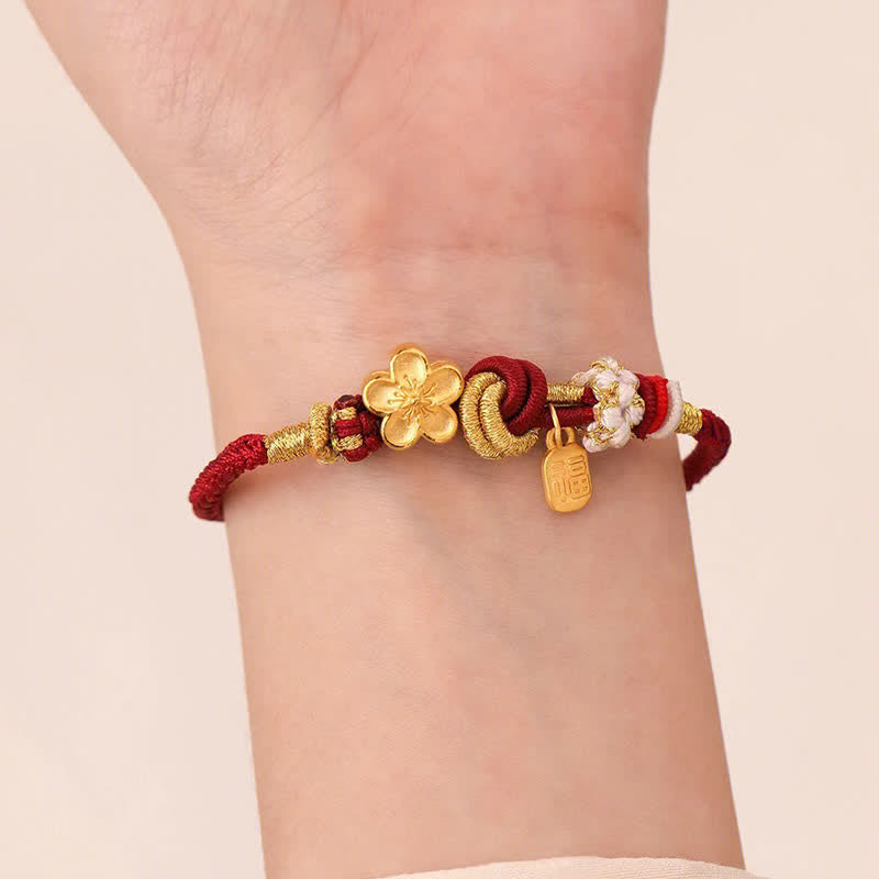 Bracelet porte-bonheur en fil rouge avec Buddha Stones et fleur de pêcher