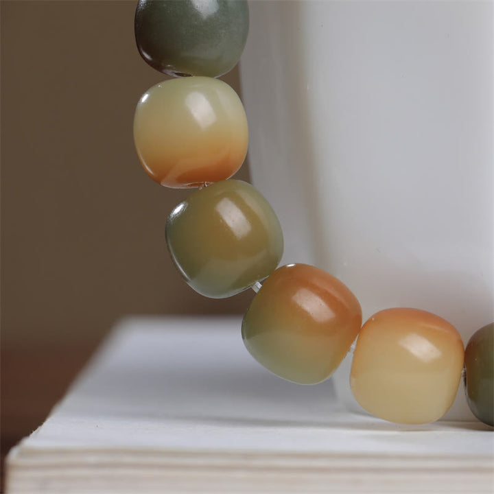 Bracelet de sagesse et de paix avec graines de Bodhi colorées et Buddha Stones