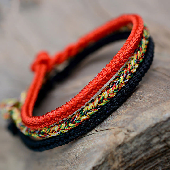 Bracelet tibétain en corde tressée à huit fils avec nœud de paix et protection fait main en Buddha Stones