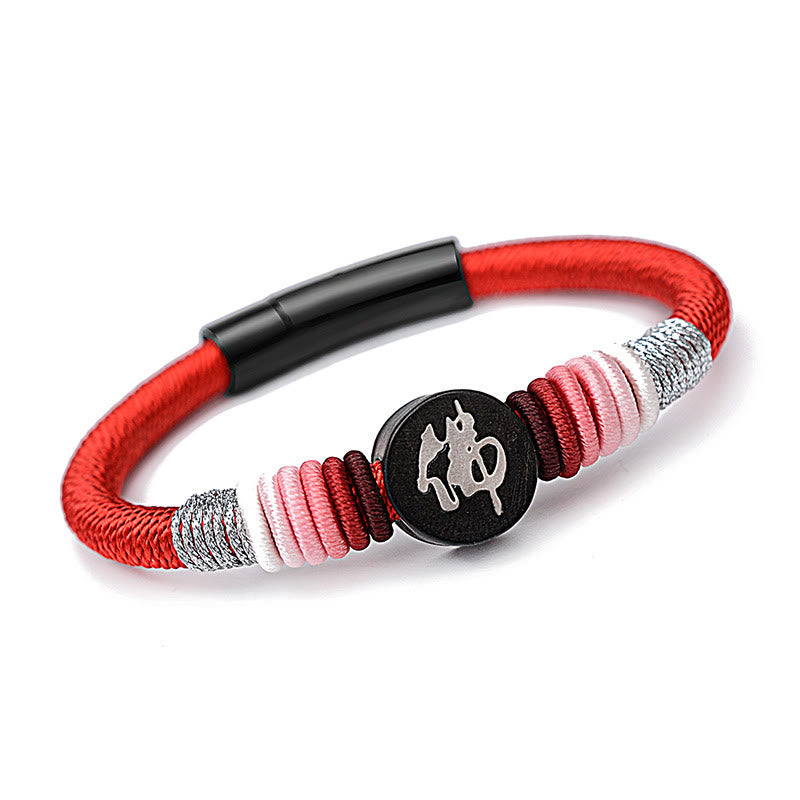 Bracelet en corde fait main en ébène avec personnage de Bouddha de Buddha Stones