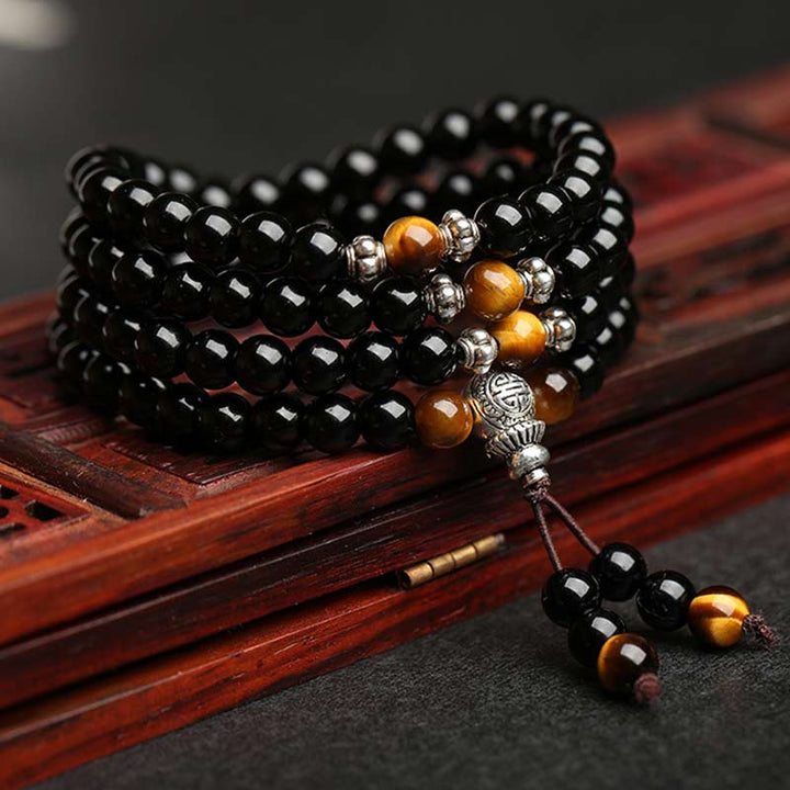 Bracelet Mala de bénédiction en obsidienne noire et œil de tigre Buddha Stones