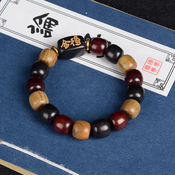 Bracelet de paix en bois de santal vert multicolore et bois d'ébène avec Buddha Stones et bois de santal rouge