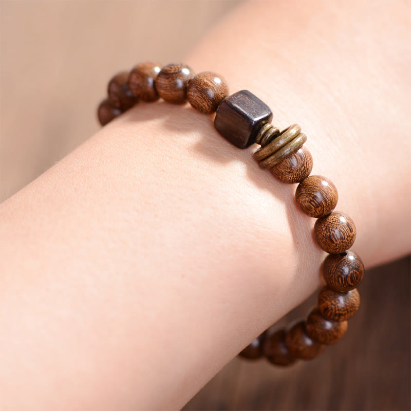 Bracelet de spiritualité en bois de Phoebe Zhennan Buddha Stones