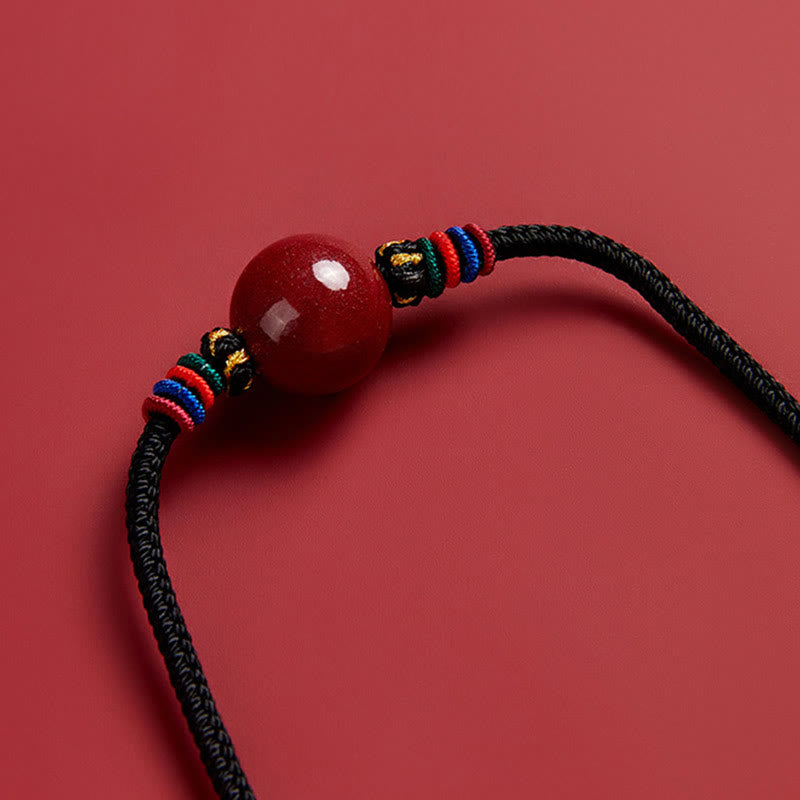 Collier avec pendentif en perles de cinabre et Buddha Stones