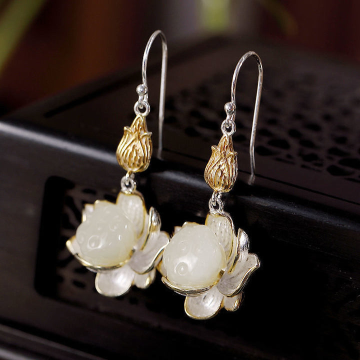 Boucles d'oreilles pendantes en jade blanc et Buddha Stones