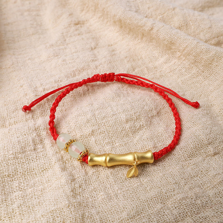 Bracelet tressé en bambou Buddha Stones et motif porte-bonheur