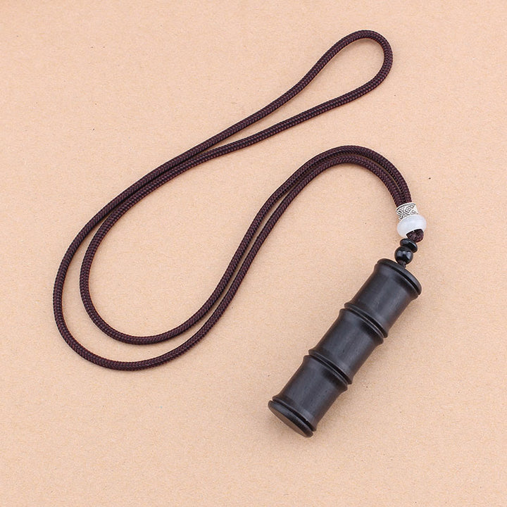 Collier pendentif en forme de boîte de prière Ghau en bois d'ébène et bambou avec Buddha Stones