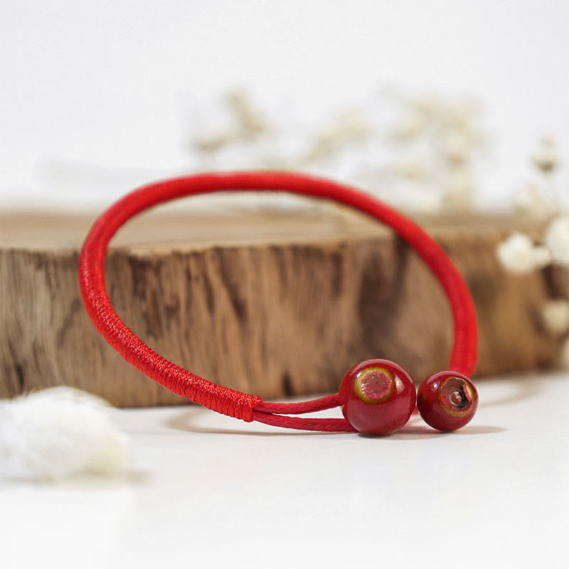 Bracelet en céramique rouge porte-bonheur Feng Shui Buddha Stones et fil rouge - image 0