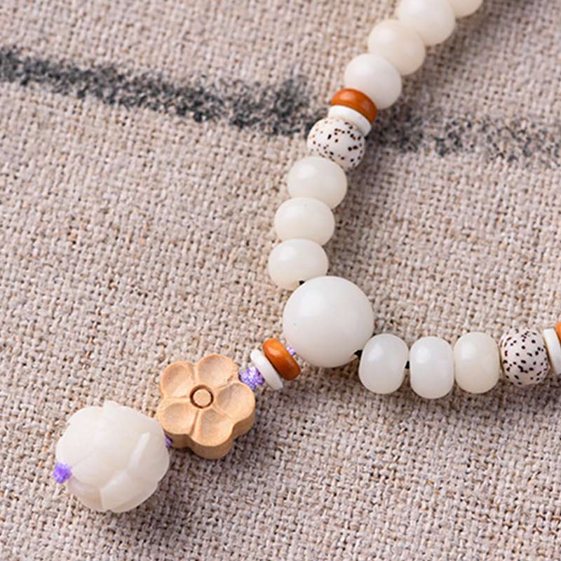 Bracelet de bénédiction Bodhi Lotus en jade blanc tibétain Buddha Stones