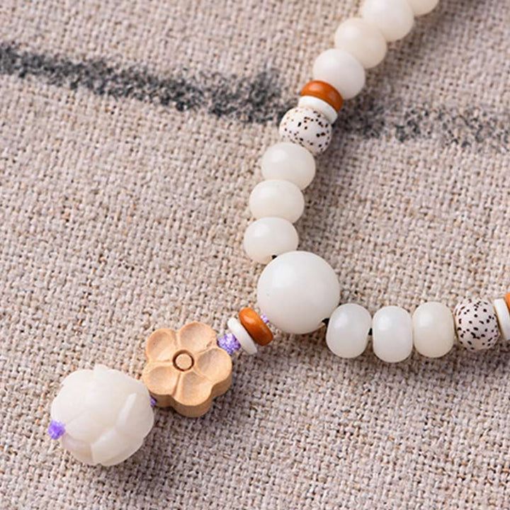 Bracelet de bénédiction Bodhi Lotus en jade blanc tibétain Buddha Stones