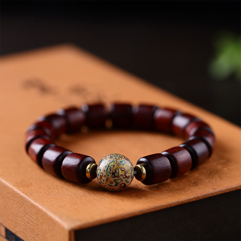 Bracelet de paix en Buddha Stones de bois de santal vert naturel et petites feuilles de bois de santal rouge laqué