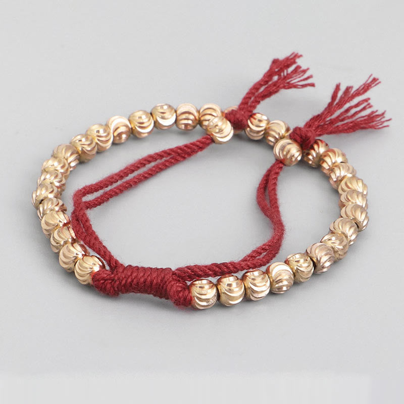 Bracelet porte-bonheur en perles de cuivre tibétaines faites à la main avec Buddha Stones