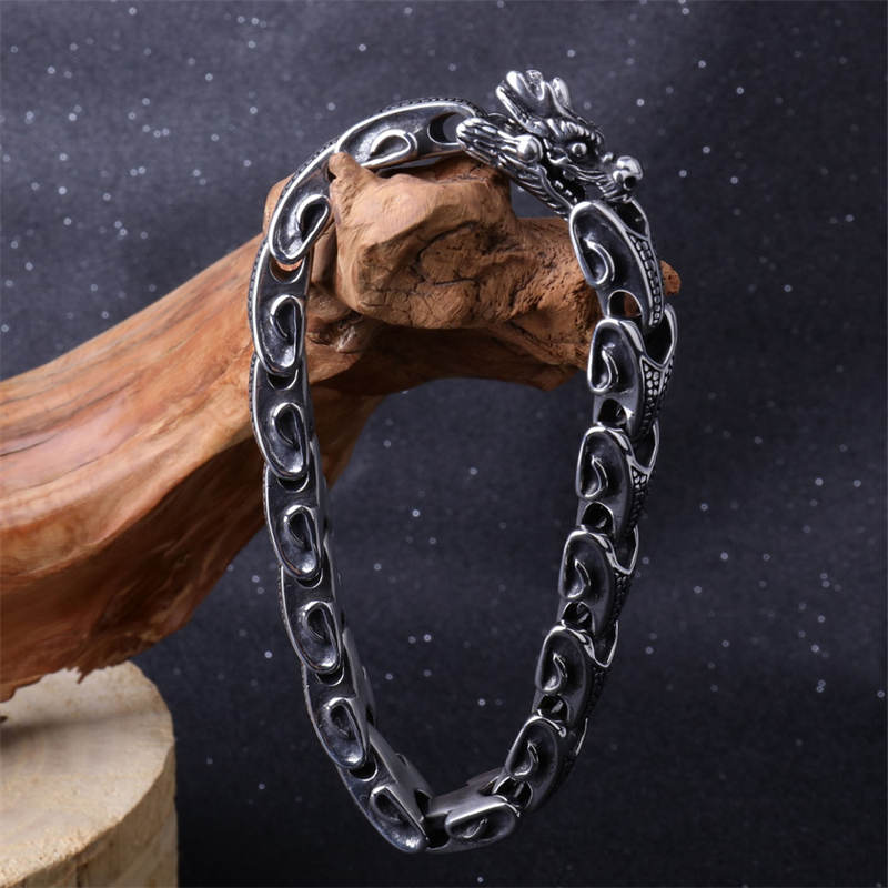 Bracelet porte-bonheur en acier titane et dragon