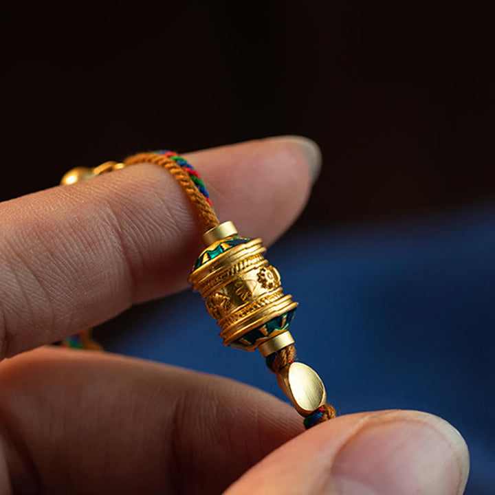 Bracelet tibétain en Buddha Stones fait à la main avec roue de prière Om Mani Padme Hum et cordon de protection