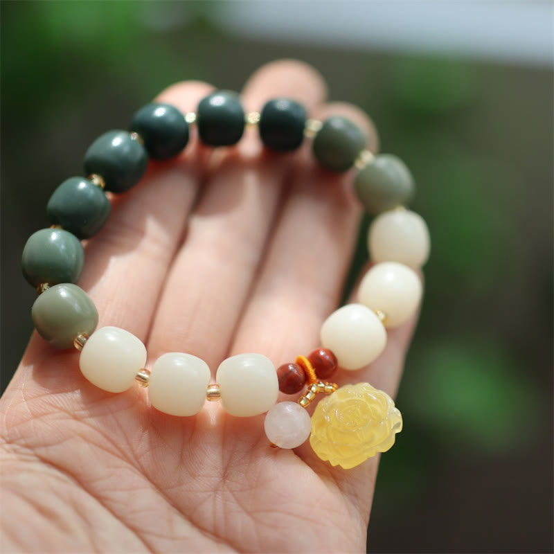 Bracelet de paix en ambre et graines de Bodhi avec Buddha Stones dégradées