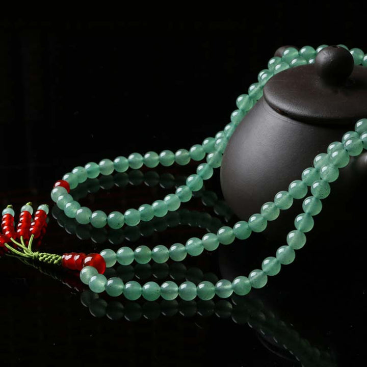 Bracelet Mala porte-bonheur en Buddha Stones, 108 perles, aventurine verte, agate rouge