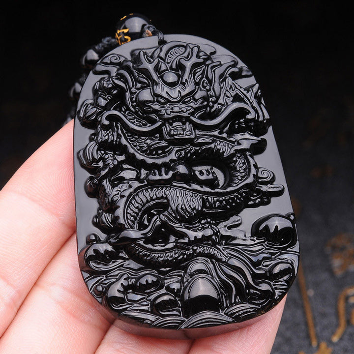 Collier avec pendentif en obsidienne noire représentant un dragon accompli et des Buddha Stones - image 3