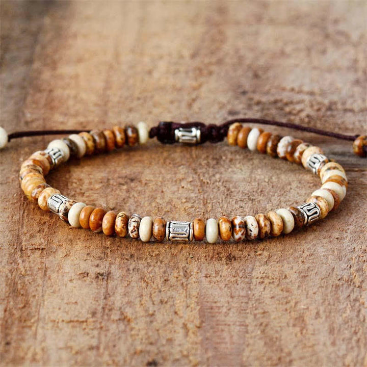 Bracelet en fil de perles positives en jaspe photo
