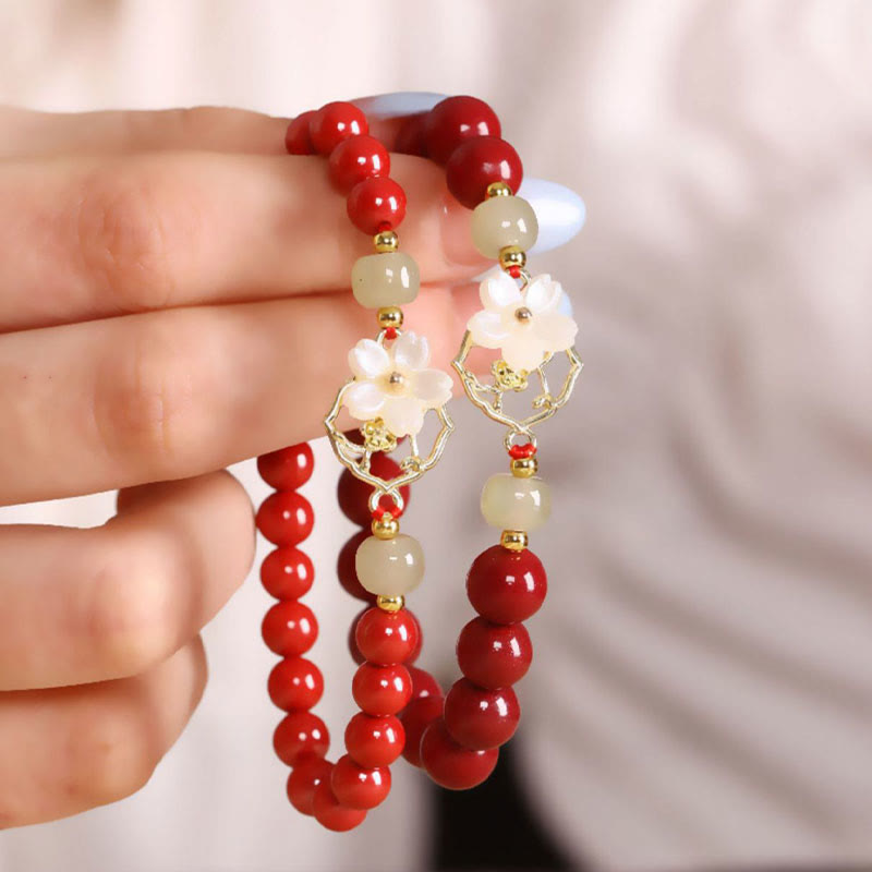 Bracelet de bénédiction en pierre de cinabre naturelle et jade Tridacna avec Buddha Stones