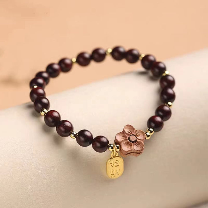 Bracelet de protection à breloques Ruyi en bois de Buddha Stones naturel et fleur de pêcher à petites feuilles en bois de santal rouge