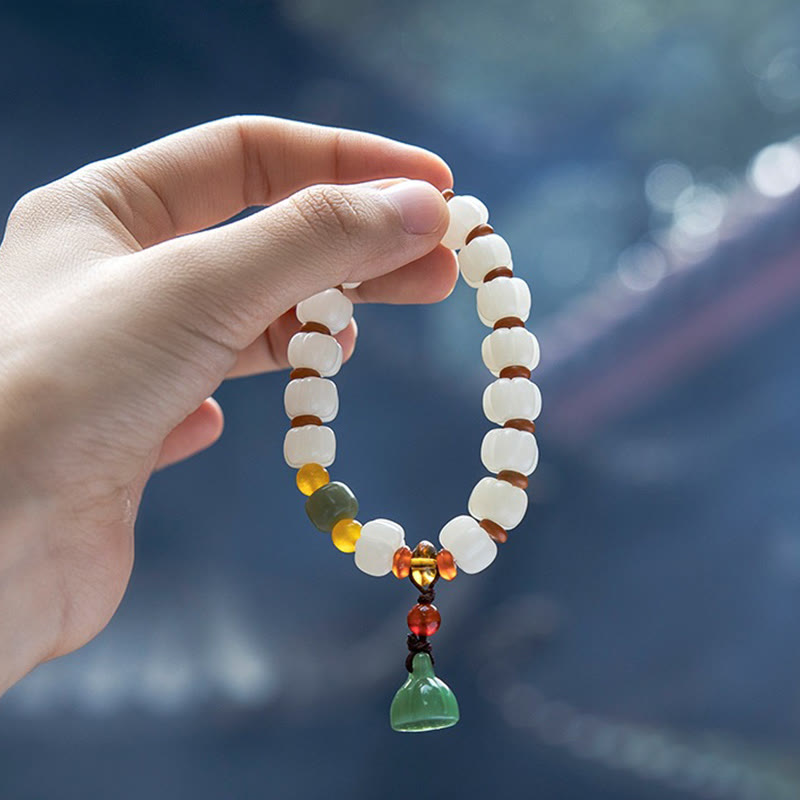 Bracelet en perles de citrouille gravées en agate rouge Bodhi Calme Harmonie Bodhi Graines naturelles Lotus