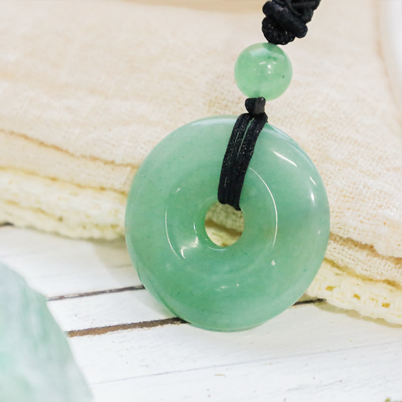 Collier avec pendentif porte-bonheur en Buddha Stones précieuses en cristal de guérison