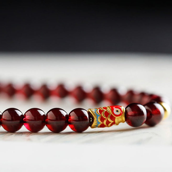 Bracelet de protection en grenat naturel avec poisson koï en or 999 de Buddha Stones - image 5