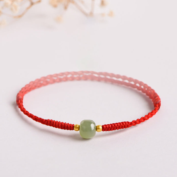 Bracelet tressé en perles de jade porte-bonheur et prospérité fait main avec Buddha Stones