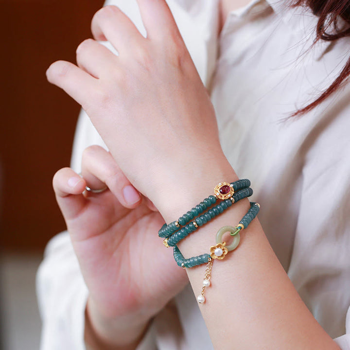 Bracelet triple tour en argent sterling 925 plaqué or avec fleur de jade cyan et boucle de paix Buddha Stones