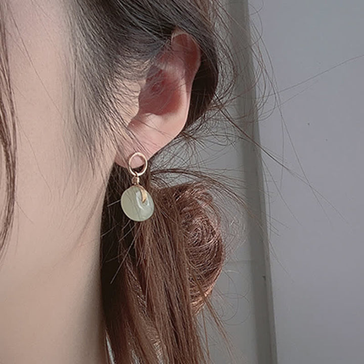 Boucles d'oreilles pendantes en jade avec Buddha Stones rondes et boucle de paix