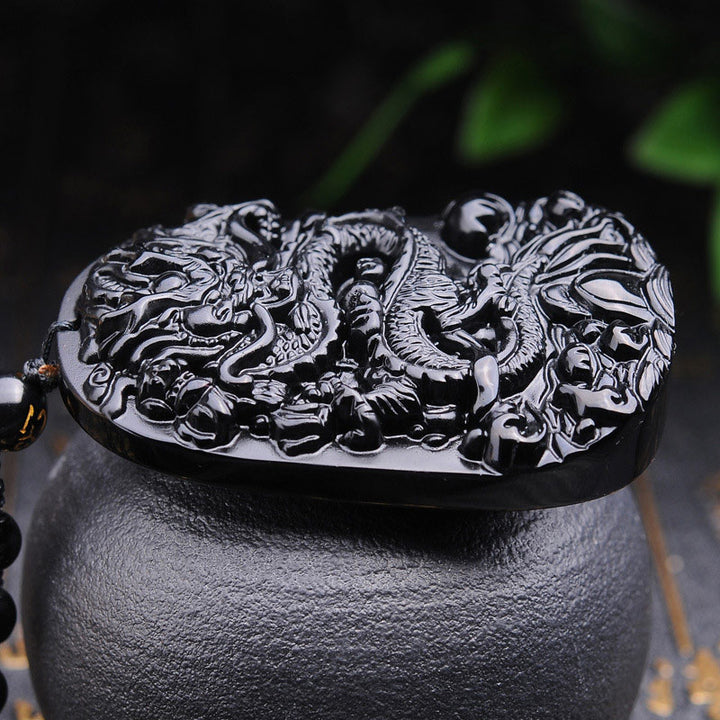 Collier avec pendentif en obsidienne noire représentant un dragon accompli et des Buddha Stones - image 4