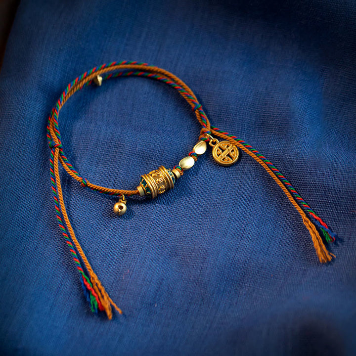 Bracelet tibétain en Buddha Stones fait à la main avec roue de prière Om Mani Padme Hum et cordon de protection