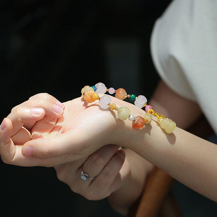 Bracelet à breloques en perles de citrouille Pixiu en soie dorée naturelle et cristaux de jade