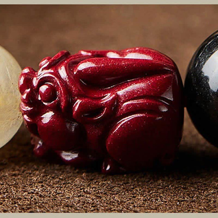 Bracelet de protection en Buddha Stones dorée et brillante PiXiu Cinabre Om Mani Padme Hum