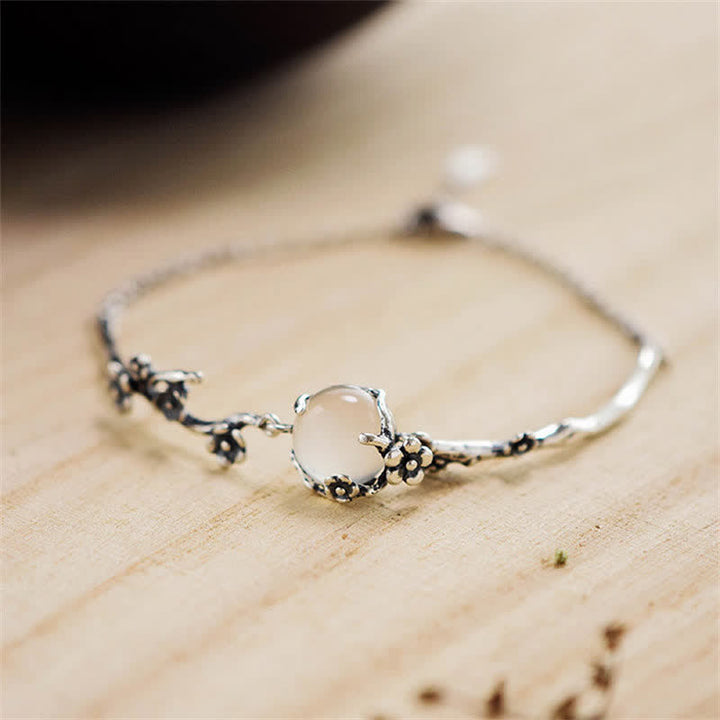 Bracelet positif en calcédoine et fleur de prunier avec Buddha Stones