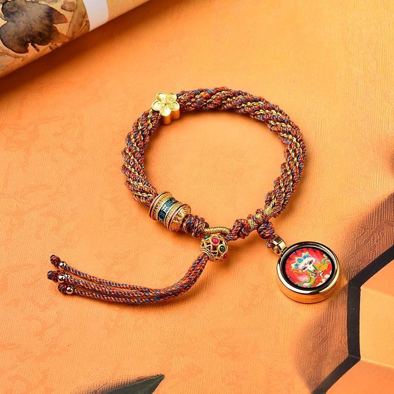 Bracelet en corde tissée avec breloque en forme de fleur et roue de prière en Buddha Stones faites à la main avec cinq dieux de la richesse et de la chance