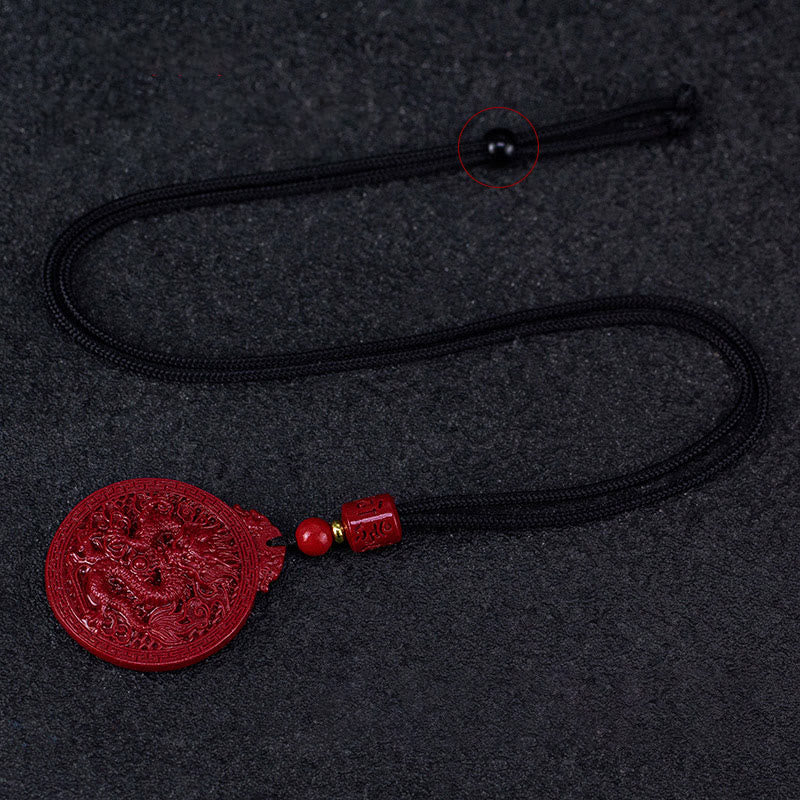 Collier pendentif de protection du dragon en cinabre naturel de l'année du dragon Buddha Stones