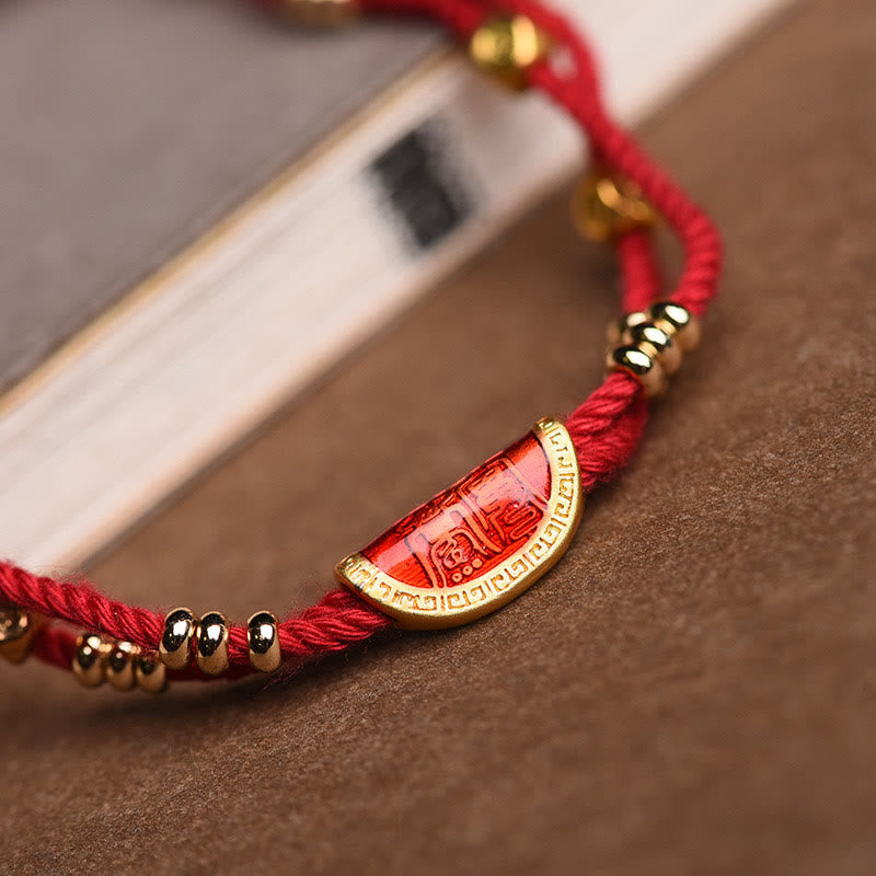 Bracelet en corde rouge tressée porte-bonheur en forme de boulettes de cinabre faites à la main par Buddha Stones
