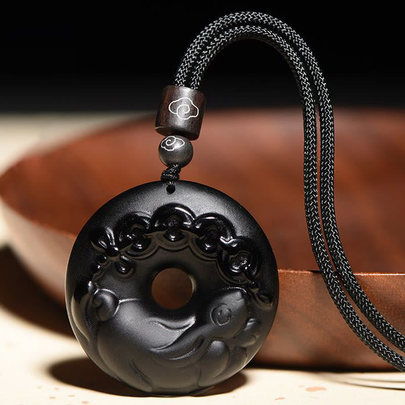 Collier avec pendentif en obsidienne noire naturelle et Buddha Stones du zodiaque chinois - Lapin - image 1