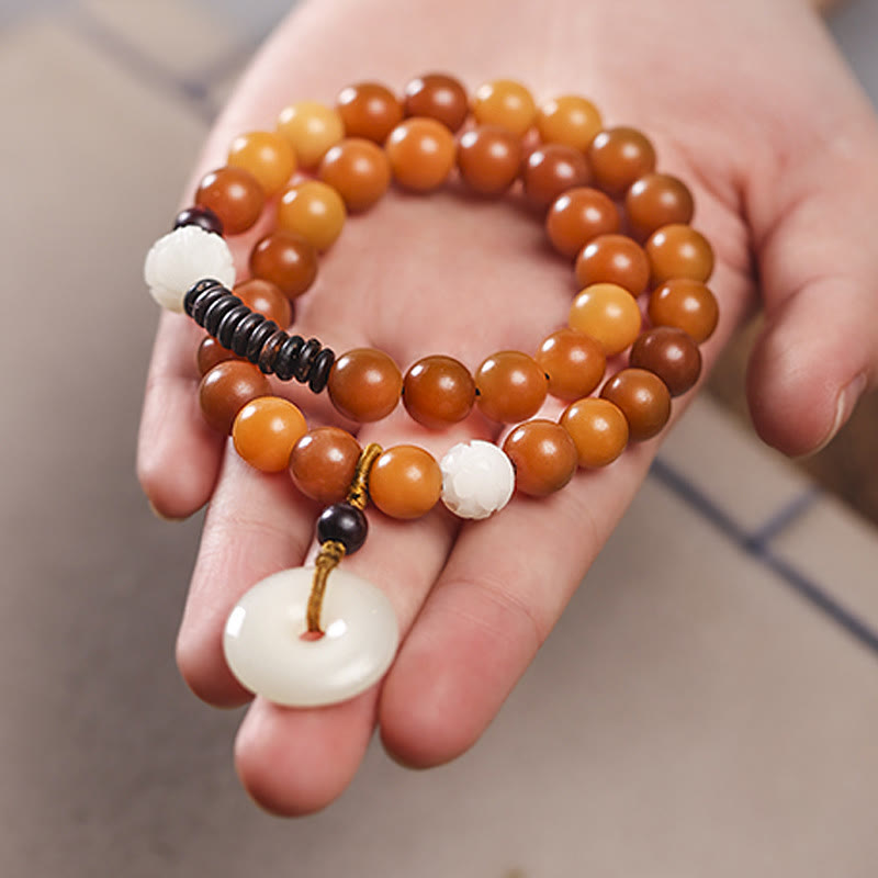 Bracelet double tour en jade et pierre de Buddha Stones avec boucle de paix et sagesse