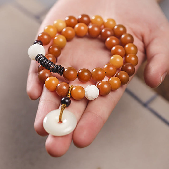 Bracelet double tour en jade et pierre de Buddha Stones avec boucle de paix et sagesse