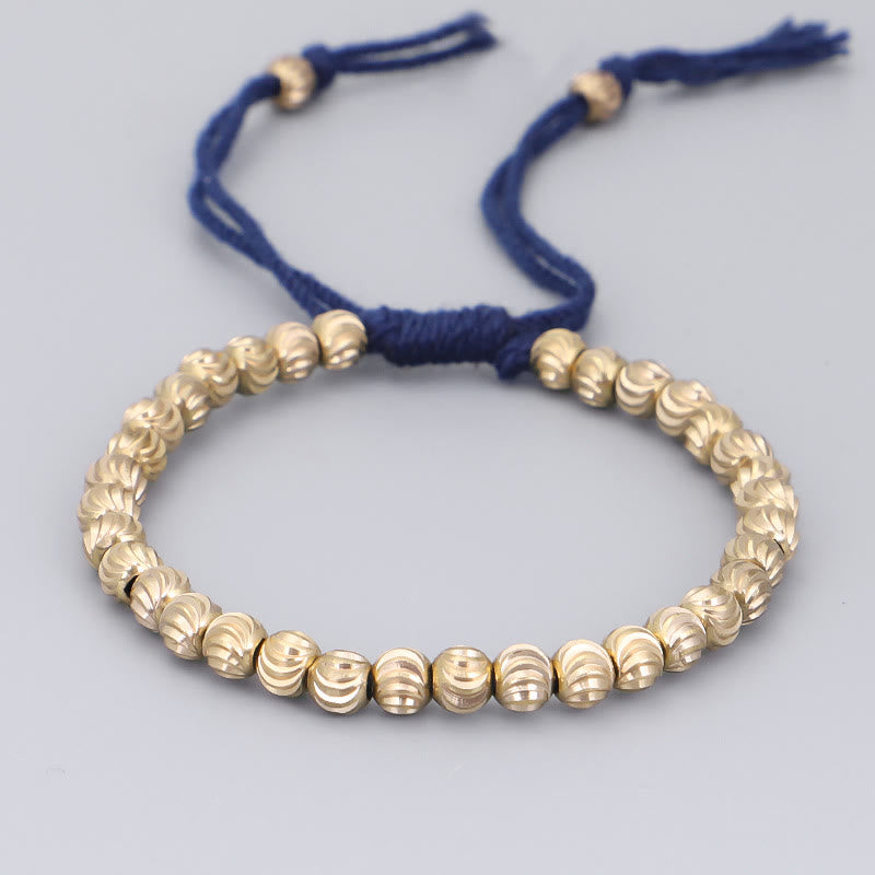 Bracelet porte-bonheur en perles de cuivre tibétaines faites à la main avec Buddha Stones