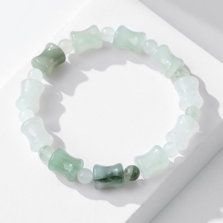 Bracelet porte-bonheur en jade et coquille de noix de coco Buddha Stones et motif bambou
