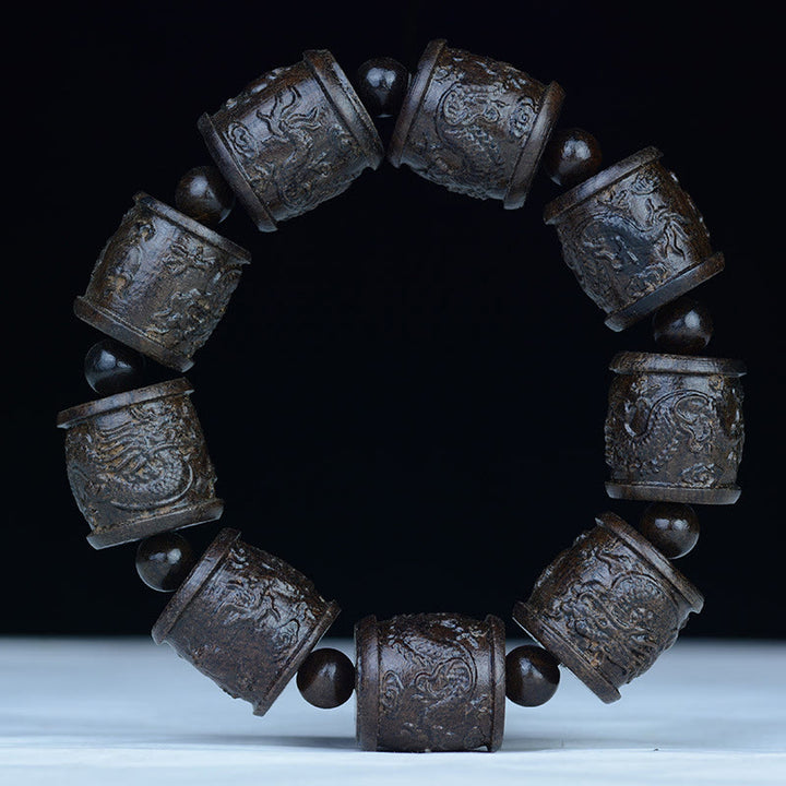 Bracelet d'équilibre gravé en bois d'ébène avec Buddha Stones et dragon de lotus des dix-huit arhats