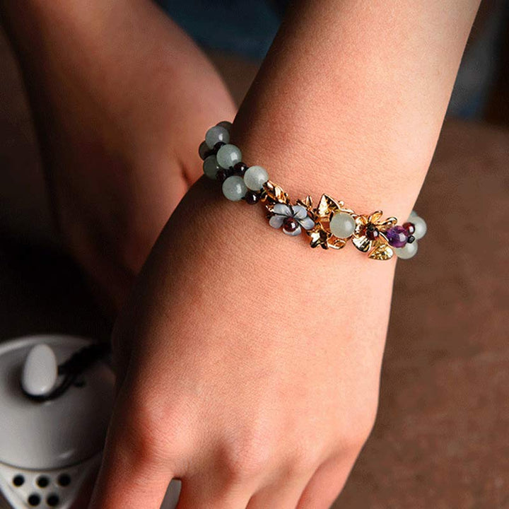 Bracelet porte-bonheur en Buddha Stones' aventurine verte et de grenat avec pétales de fleur