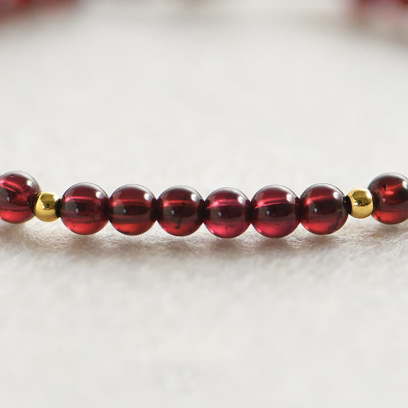 Bracelet de stabilité en perles dorées et grenat naturel avec Buddha Stones - image 3